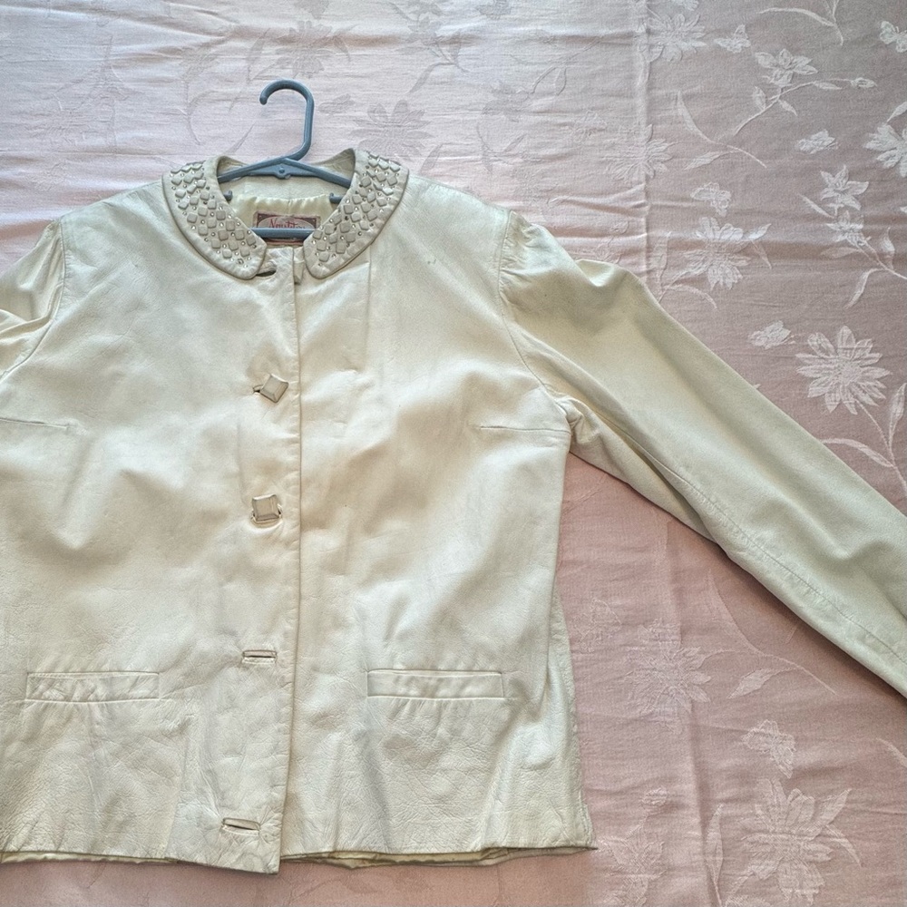 White leather retro Samuel Robert jacket from Neusteters department store